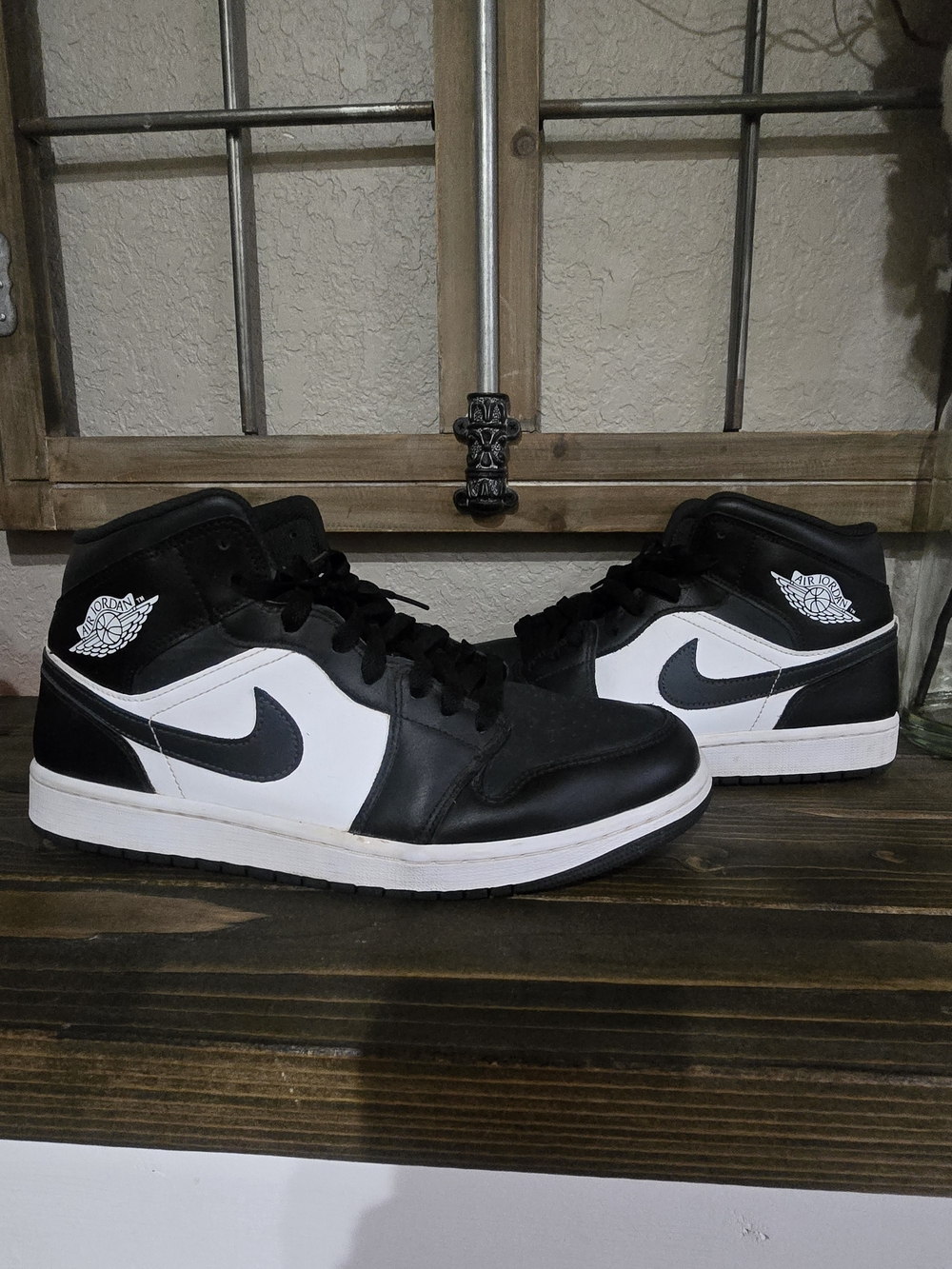 Nike Black and White Mid-Top Sneakers